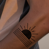 Tatuaggio alba geometrica