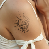 Tatuaggio sole e loto