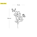 Tatuaggio fiore con due farfalle