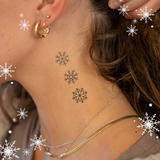 Tatuaggio con tre fiocchi di neve