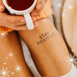 Tatuaggio "Stay Positive"