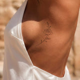 Tatuaggio rosa delicata