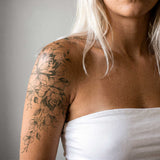 Wildblumen-Zweig Tattoo