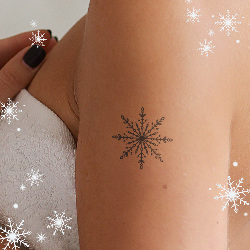 Tatuaggio con bellissimo fiocco di neve